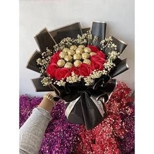 Send 16 Frerro Rocher With 16 Roses Gipso