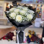 10 white imported roses bouquet