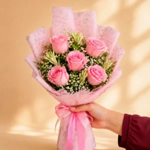 Blush rose bouquet with five pink roses and white filler flowers