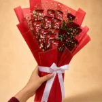 KitKat Rose Affair bouquet with 10 KitKats, red roses and gypsophila