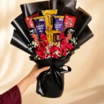 Noir Romance bouquet with KitKat Mars Dairy Milk red roses and Gypsophila